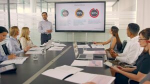 business meeting using Microsoft systems and laptops
